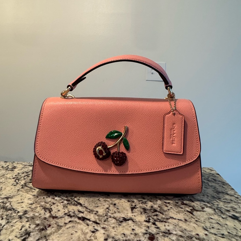 Pink Coach Leather Handbag with Cherry Emblem